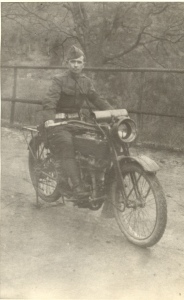 Pvt. A.L. Gooch on his motorcycle, WWI 89th Div., Military Police